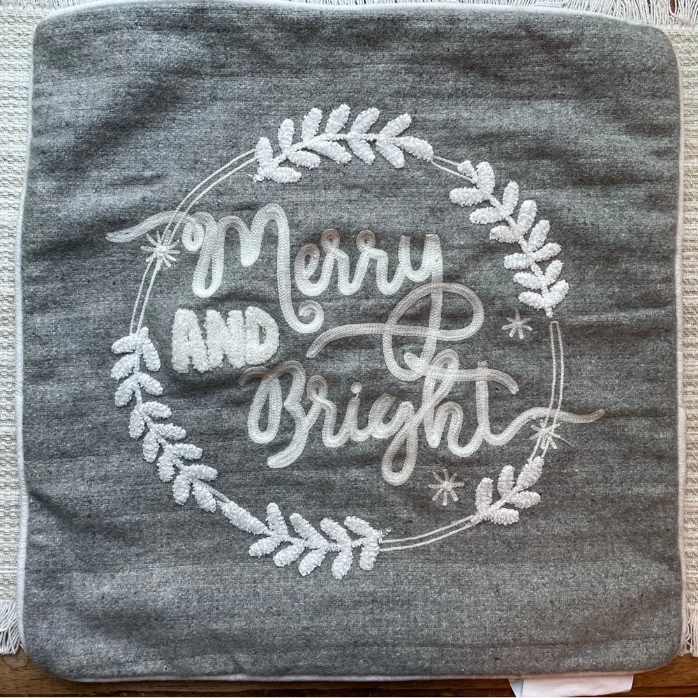 Pier 1 Merry and Bright embroidered gray and white pillow case.